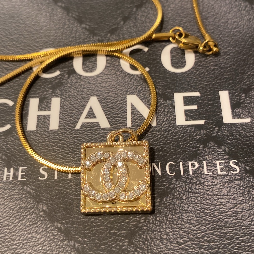CHANEL stamped Zipper Pull Pendant - Picture 1 of 9